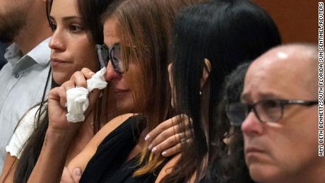 Patricia Oliver is comforted as a witness testifies about her son&#39;s fatal injuries during the penalty phase of the trial of the Marjory Stoneman Douglas High School shooter at the Broward County Courthouse in Fort Lauderdale, Florida, on Monday.