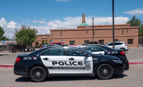 Albuquerque Police patrol the parking lot at the Islamic Center of New Mexico in Albuquerque on August 7.