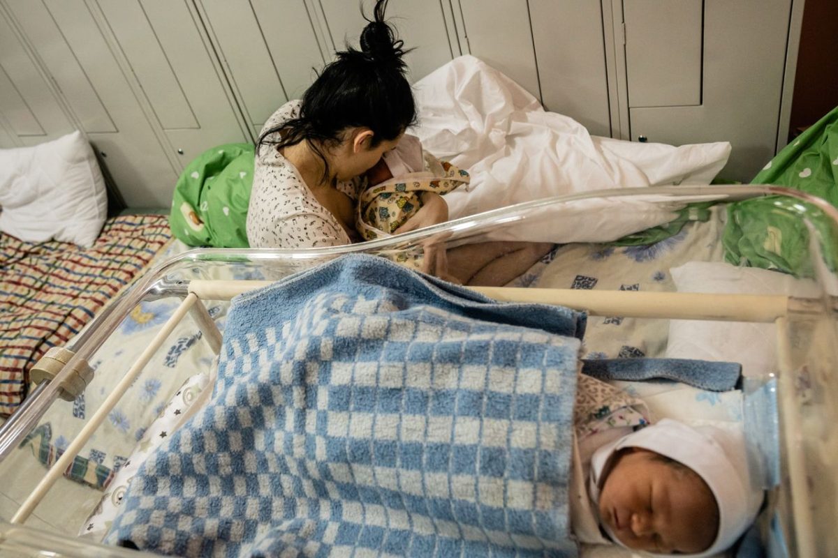 A mother cares for her two infant sons in the underground shelter of a maternity hospital in Kyiv on March 3. She gave birth a day earlier, and she and her husband haven