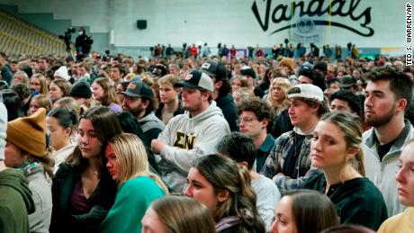 People crowded into a vigil for the four victims Wednesday evening. 