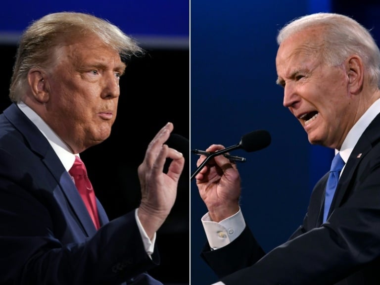Uma montagem de Donald Trump e Joe Biden, 22 de outubro de 2020 Brendan Smialowski