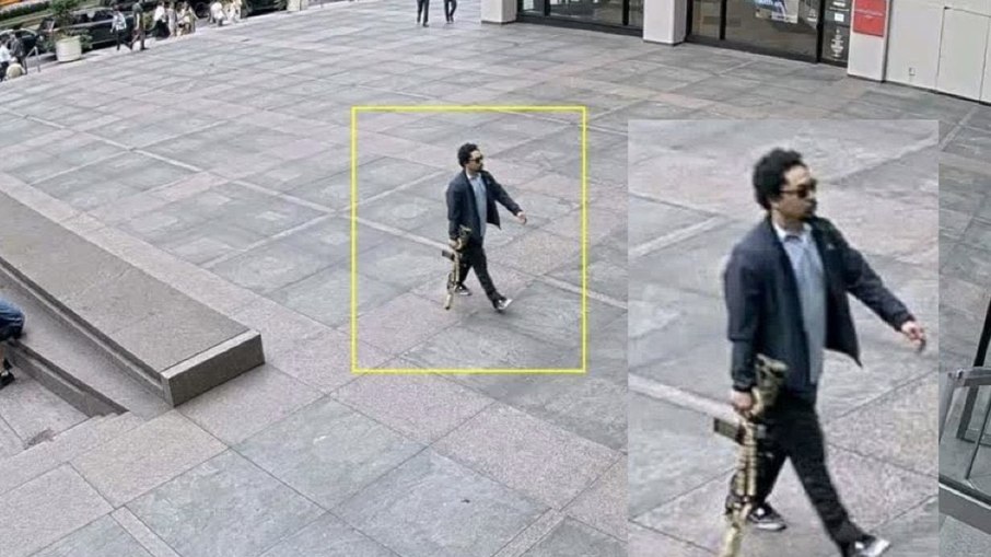 Atirador foi visto entrando no prédio com fuzil na mão Atirador foi visto entrando no prédio com fuzil na mão