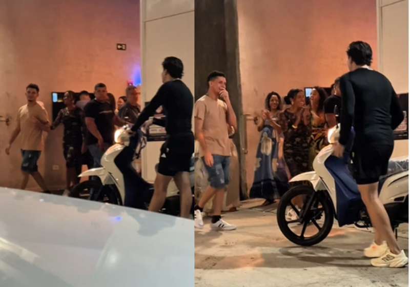 Cantor dá moto a jovem que andava 12 km por dia para estudar; vídeo O cantor Eric Land deu uma moto de presente para o jovem que viralizou por andar 12km até a faculdade. - Foto: reprodução redes sociais