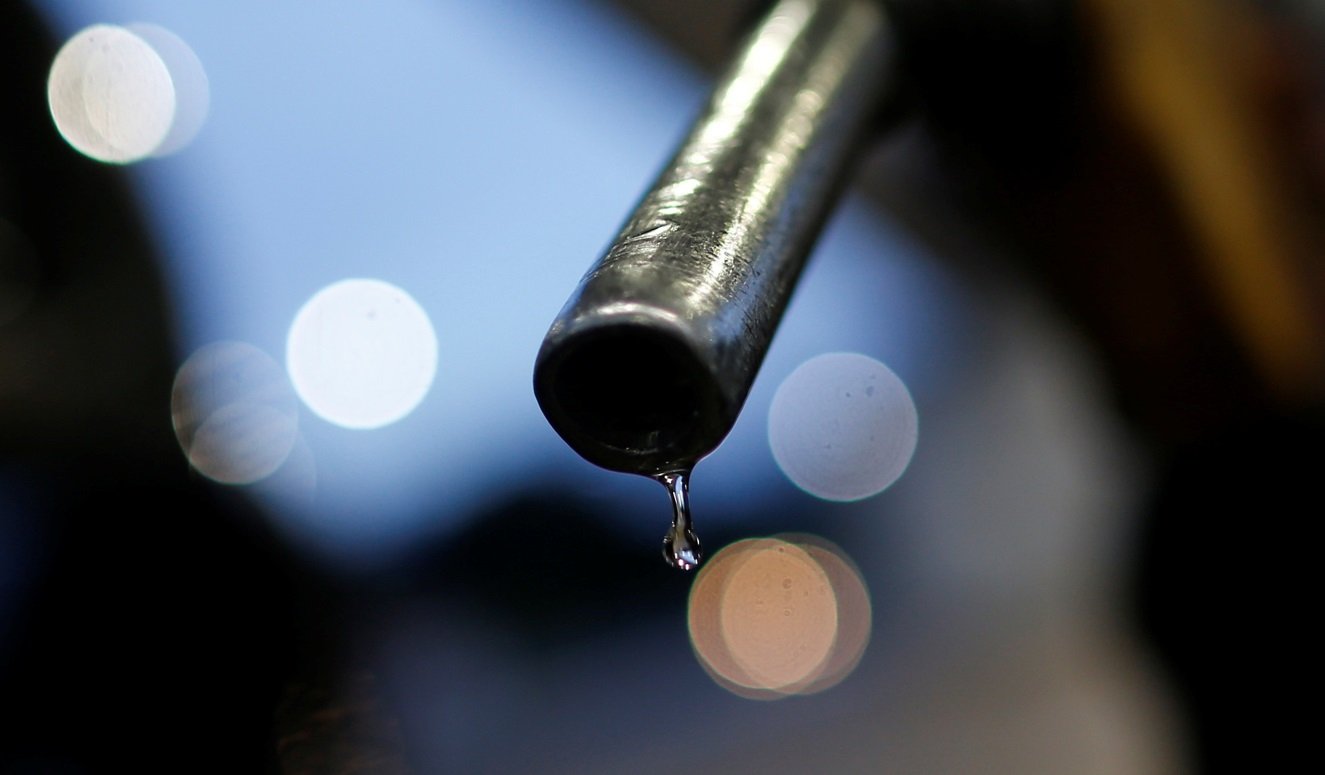 Pistola de gasolina em posto de combustíveis