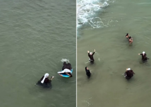 Freiras com prancha se divertem em praia de surfistas em Búzios